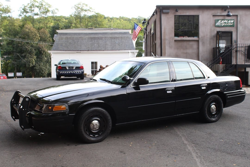 An Unmarked Ford Crown Victoria Police Interceptor.